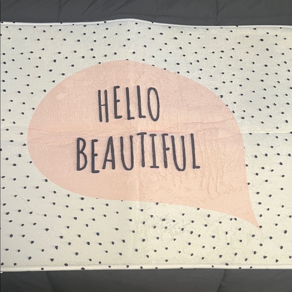 bathroom rug and shower curtain that says Hello Beautiful